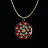 Red green gold white Mandala themed resin necklace
