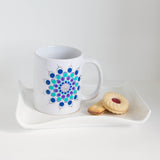 Hand painted Mandala mug, blue, green silver, purple.