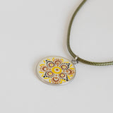 White yellow brown black resin Mandala pendant