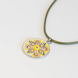 White yellow brown black resin Mandala pendant