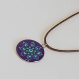 Hand painted resin Mandala pendant, purple, green, silver