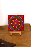 Colourful mini dot mandala on mini easel red yellow green orange white