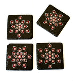 Black slate coasters decorated with red white silver dots