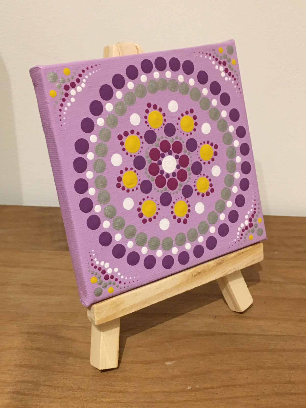 Small dot mandala with own easel purple yellow white silver