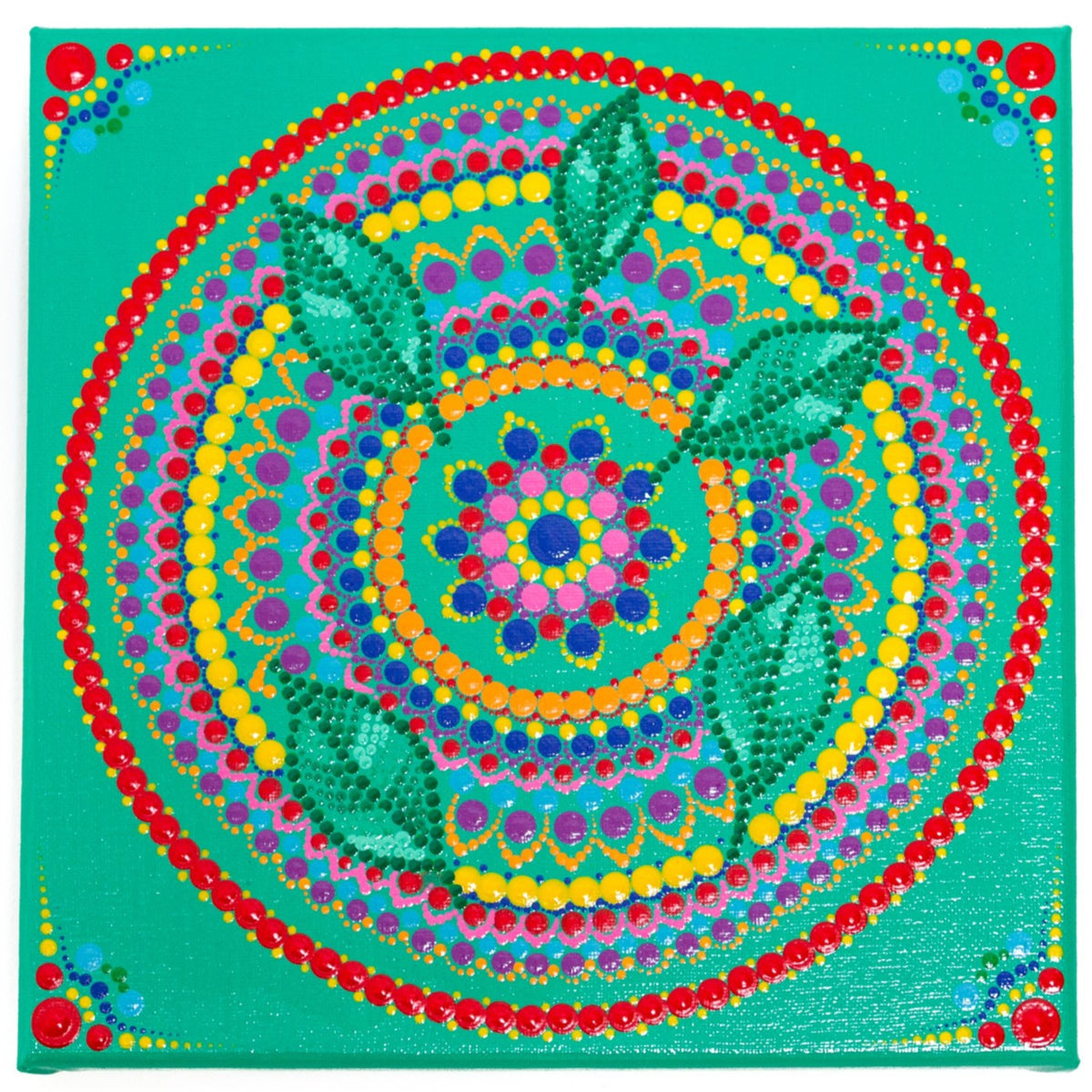 Colourful dot Mandala with leaves blue red purple orange yellow green