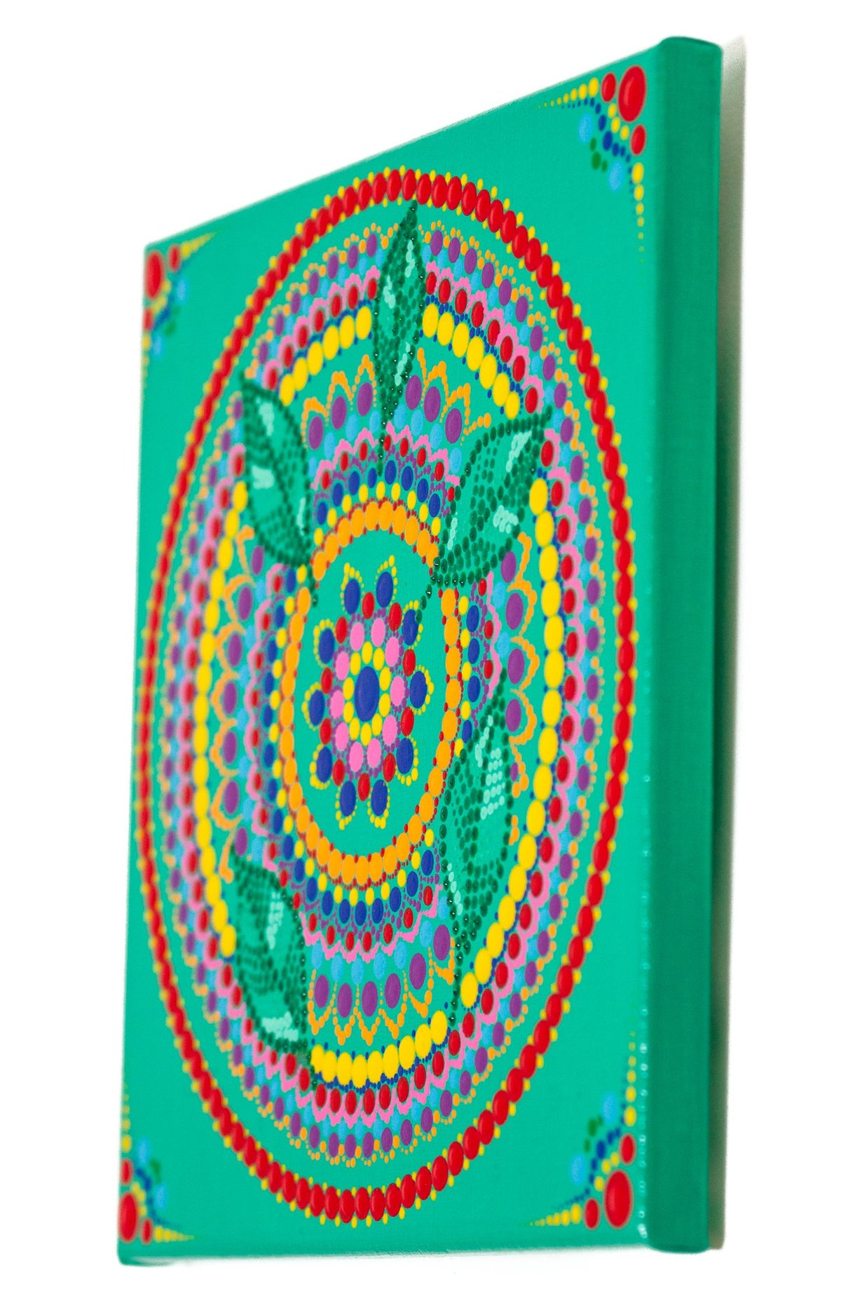 Colourful dot Mandala with leaves blue red purple orange yellow green