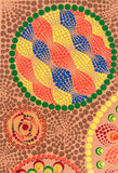 Dot Mandala detail, blue yellow red brown on peach background