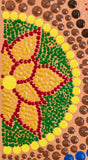Dot Mandala detail, green red gold yellow brown on peach background 