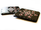 Black slate coasters decorated with red white silver dots